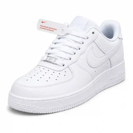 White Nike Air Force 1 sneakers with Swoosh logo and textured rubber sole